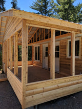 Cedar screen room under construction. Add space to keep bugs away.