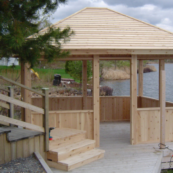 Cedar gazebo installed on wood dock.